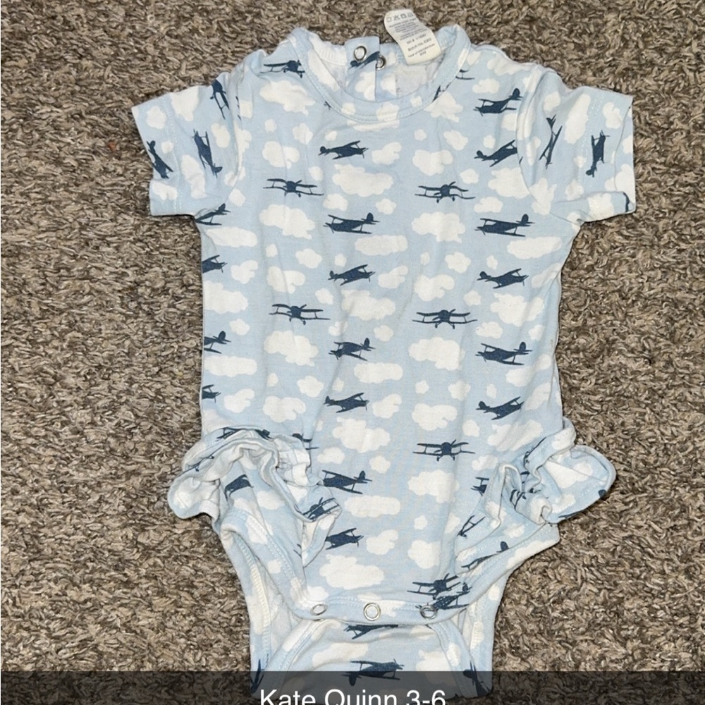 Kate Quinn Sky Blue Bodysuit with Airplane Design